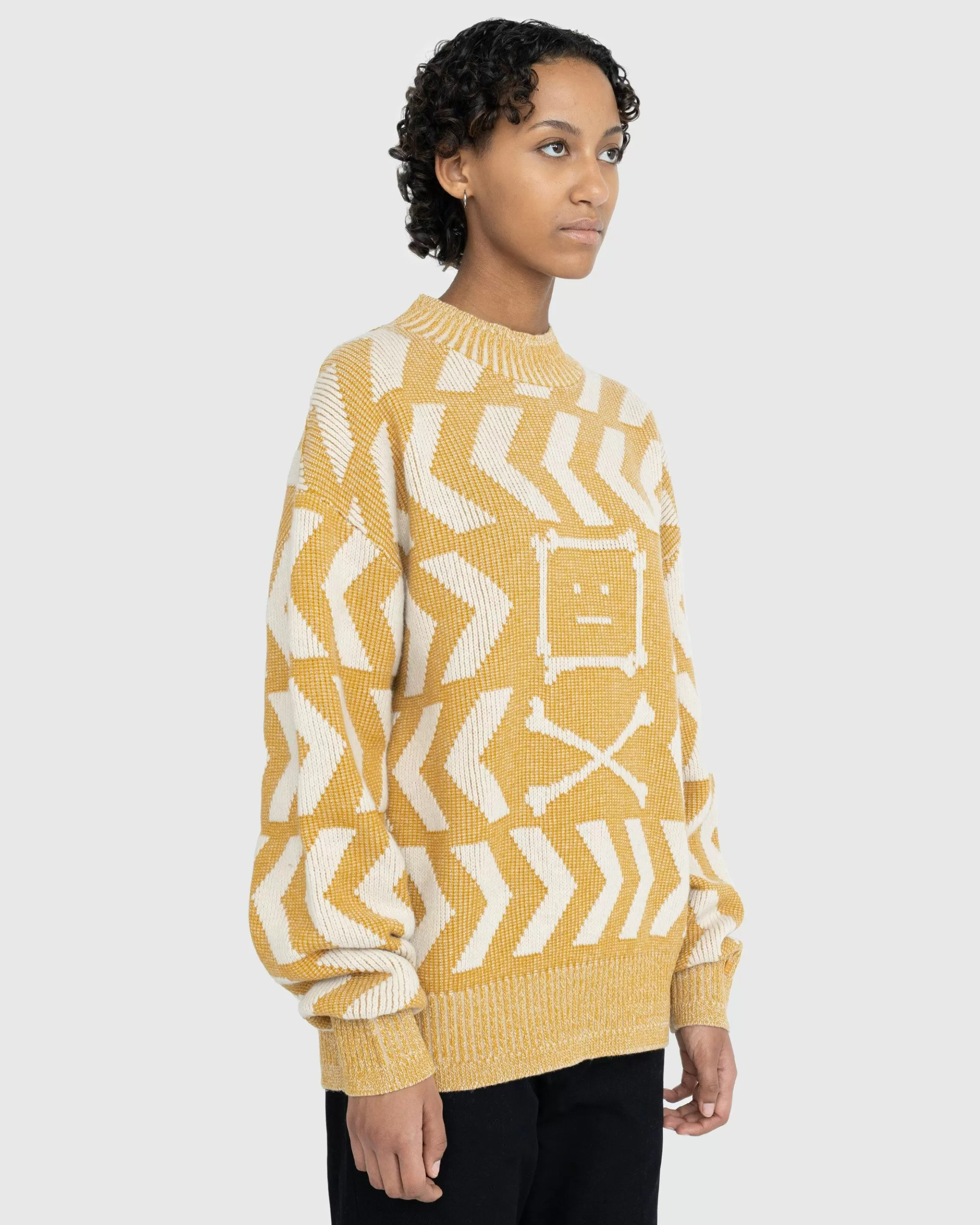 Shop Acne Studios Face Crossbones and Arrow Crewneck Sweater yellow