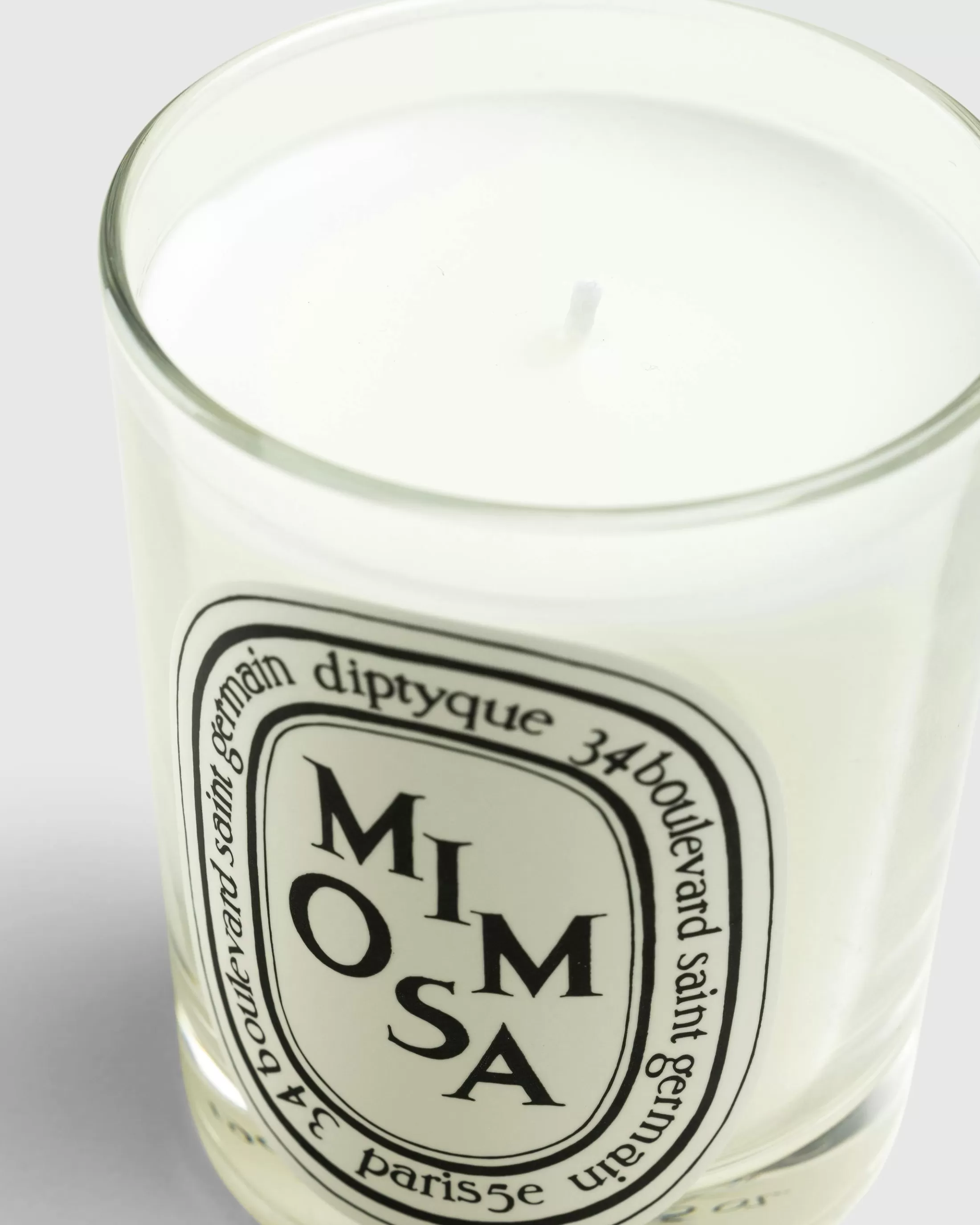 Store Diptyque Standard Candle Mimosa 190g clear